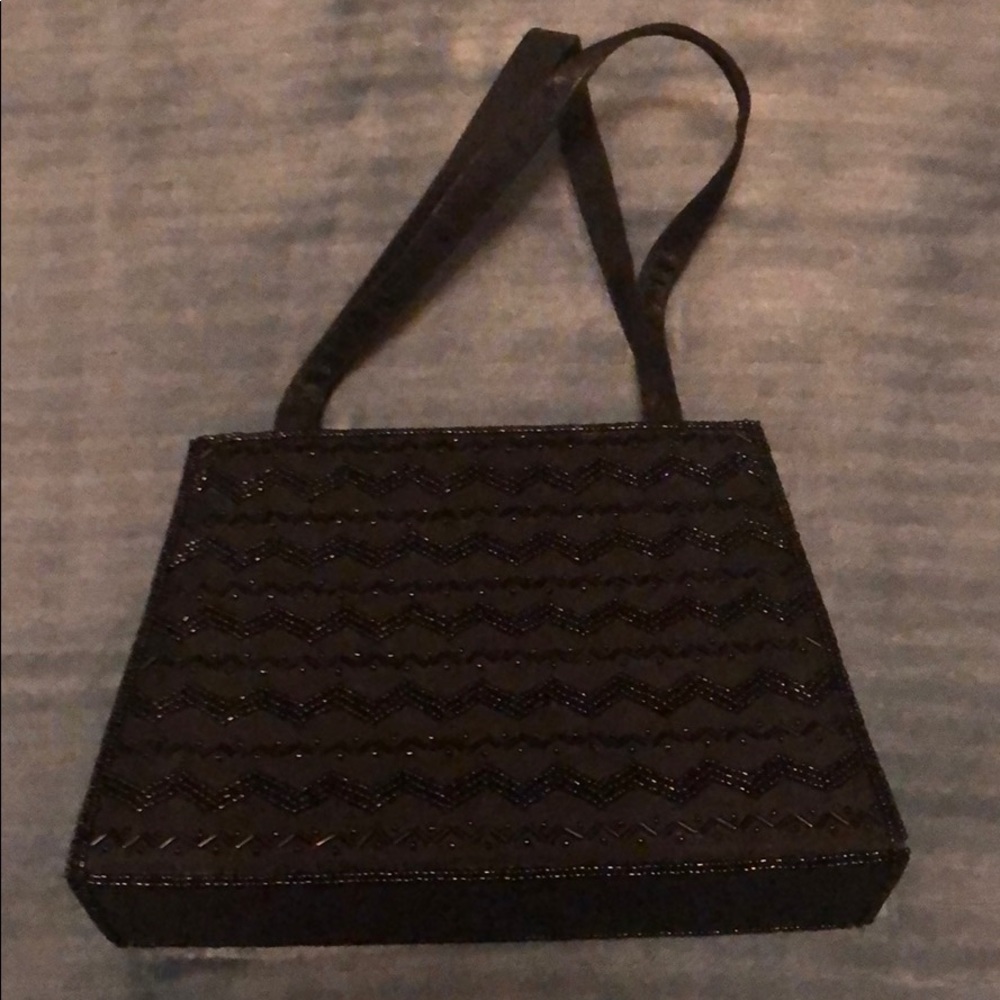 Valerie Steven’s black satin/beaded evening purse